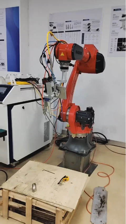 Robot welding equipment shown with a laser system